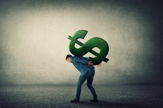 借金まみれ（写真:iStock）